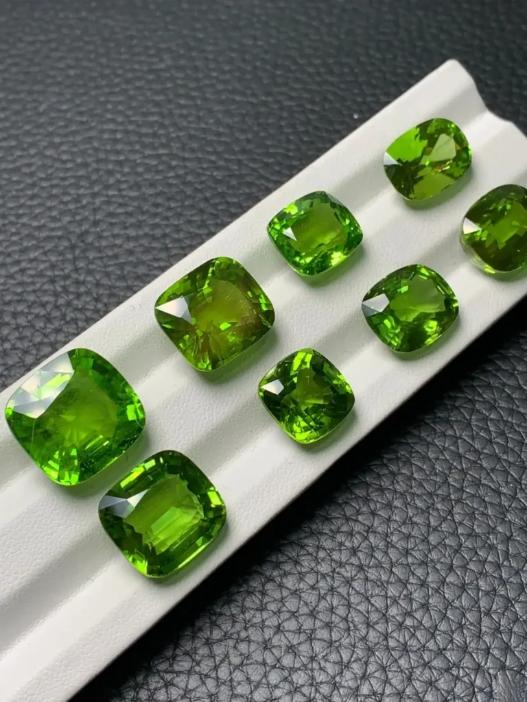 A collection of faceted “Gem of the Sun” from Myanmar, each exceeding 10 carats in weight.