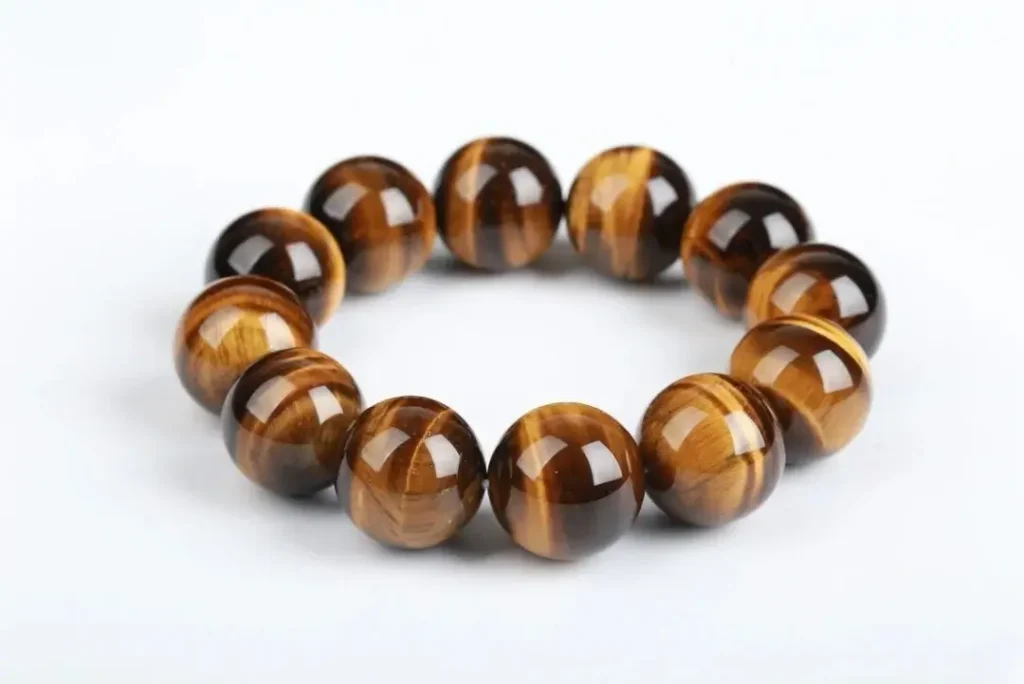 Polished natural Chatoyant Quartz (Silicified Wood variety) showcasing distinct silky chatoyant bands.