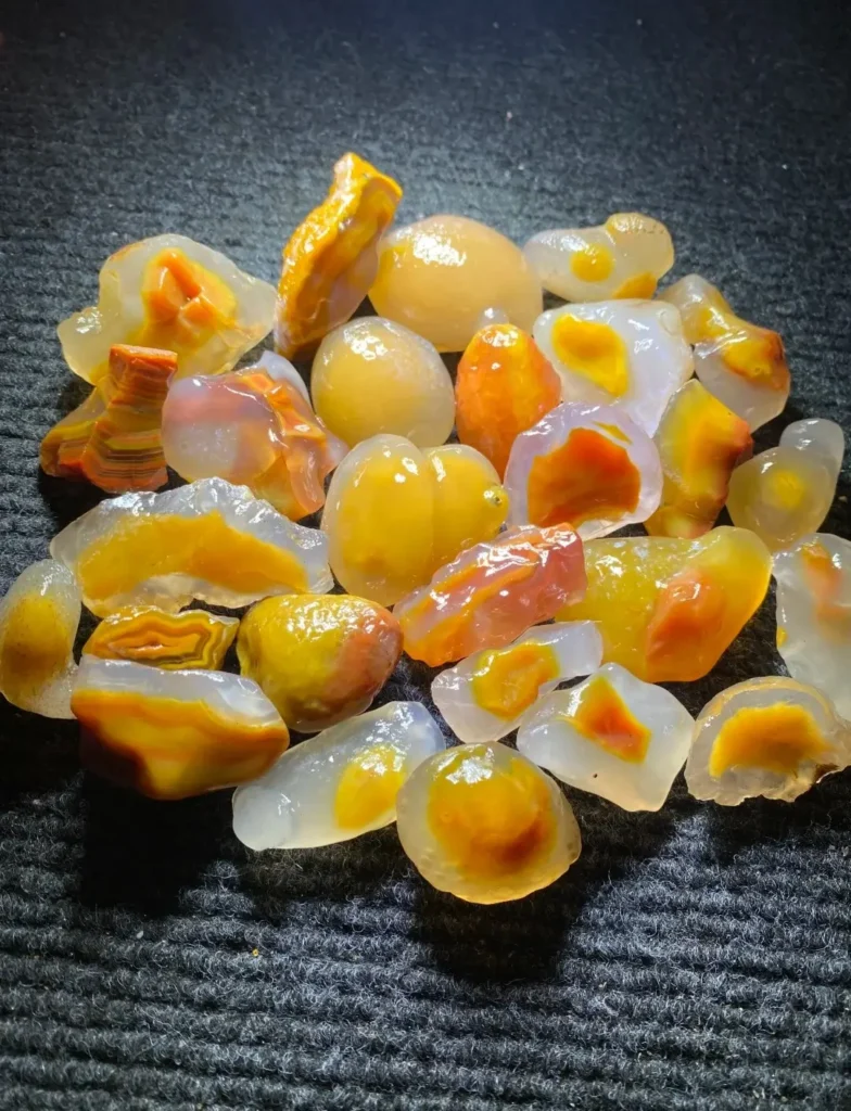 Alashan Sugar-Heart specimens with translucent shells and vivid yellow cores resembling egg yolks.