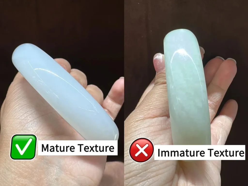 Close-up of mature, waxy nephrite bangle (left) vs. dry, immature nephrite bangle (right).