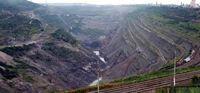 Aerial view of the West Open-Pit Mine in Fushun, a massive historical mining site in Liaoning.