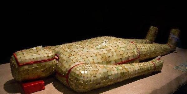 The Han Dynasty jade burial suit of Prince Liu Sheng, made of Xiuyan jade plaques and gold wire.