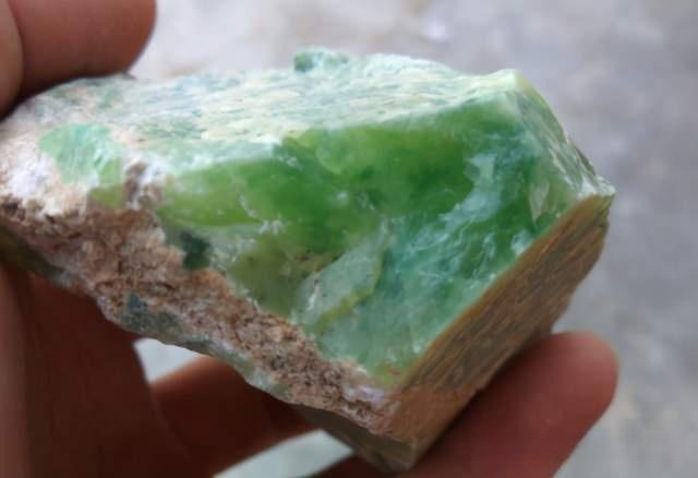 A raw Huilong specimen from Tongbai, Henan, showing a dense, skarn-type mineral structure.