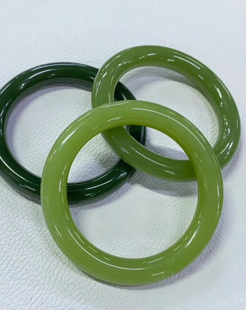 Three iconic green stones bangles representing the variety's most prestigious color standards.