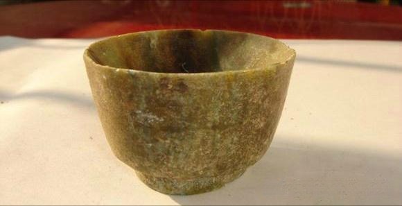 Ancient Tang Dynasty ceremonial cup carved from authentic pale-green Lantian Jade.