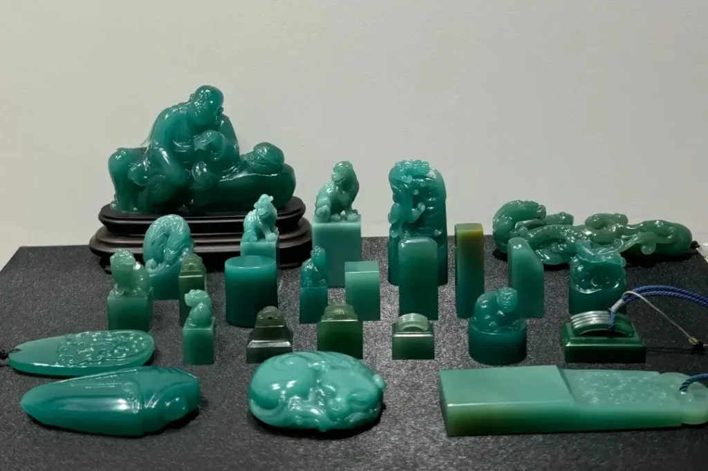 Polished Sichuan Ya’an Green seals showcasing vibrant, emerald-like saturation and fine texture.