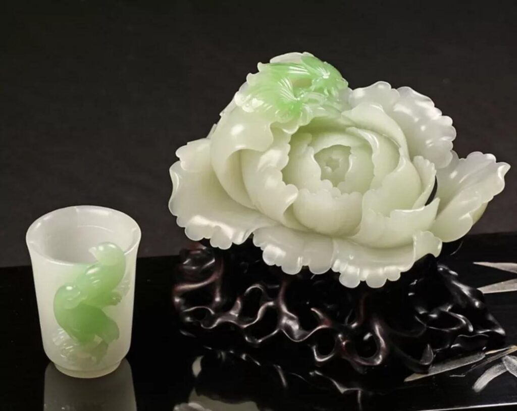 Cui Qing Nephrite artistic playpiece with delicate green accents by Yin Xiaojin.