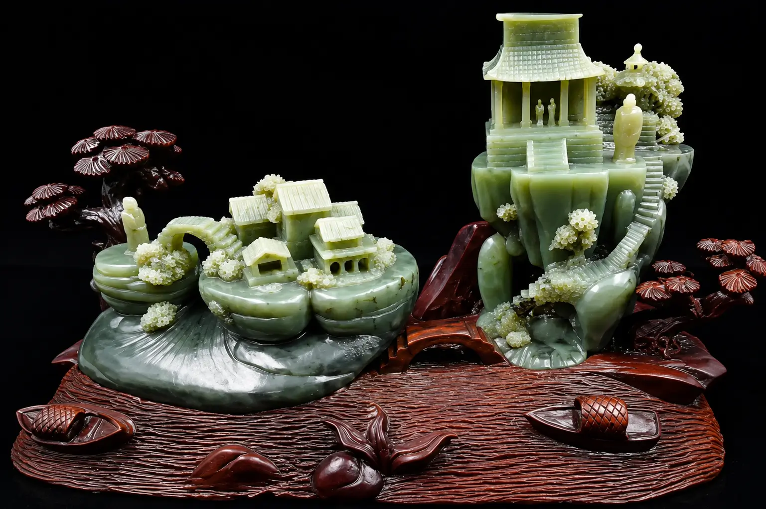 Intricate Chinese nephrite landscape carving of mountain scenery in green Xianghua jade
