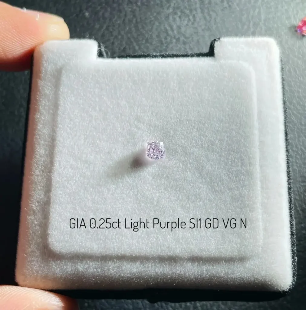 A small light purple diamond centered inside a white display box with a black text label.