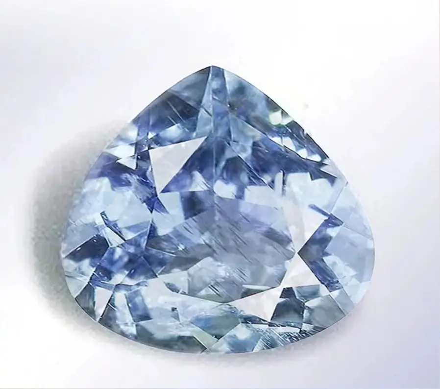 A 7.34-carat heart-shaped fancy vivid purple diamond on a white background.