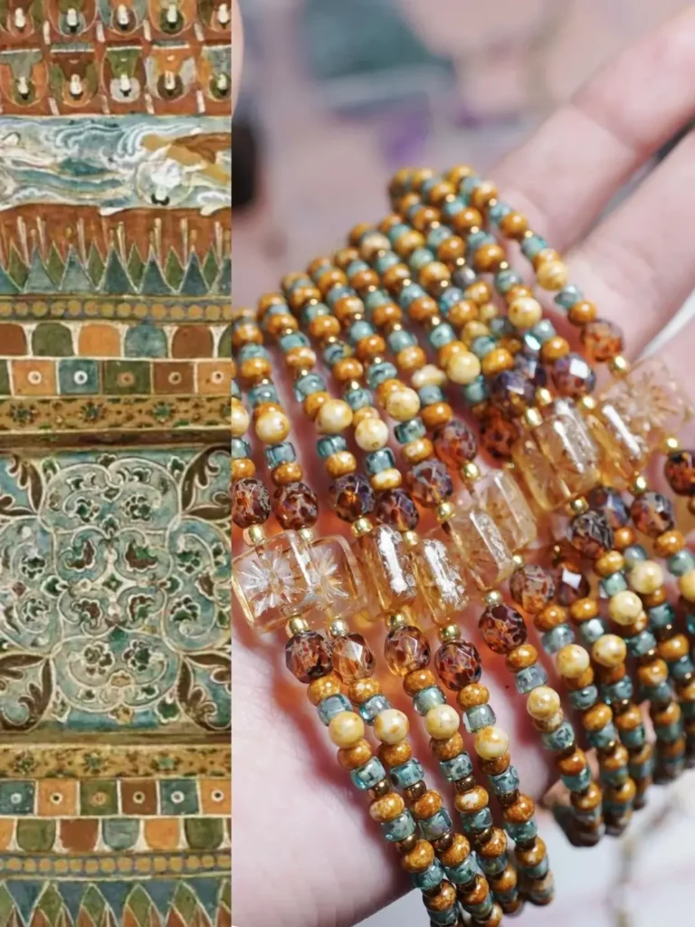 Hand holding multiple Dunhuang Vintage Bracelets, showing fire-polished Picasso-finish round beads with weathered mineral oxide patterns and clear glass flower tiles.