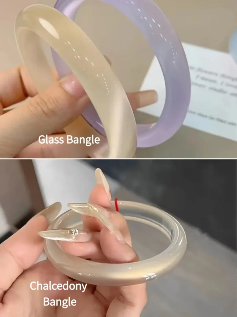 Comparison of glass bangles in purple and white and a translucent chalcedony bangle in hands.