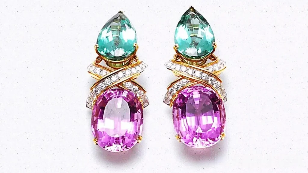 Tiffany earrings featuring pear-cut green tourmalines and oval pink kunzites with crisscross diamond ribbons.