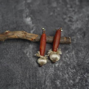 Handmade red agate drop earrings with white copper and hand-twisted cotton thread.