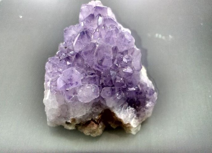 Semnan Iranian amethyst crystal showing purple quartz formations.