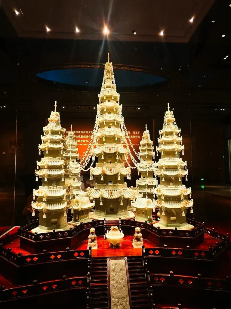 White jade Five Elements Pagoda featuring intricate interlocking ring structures.