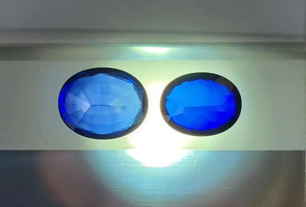 Magnified comparison of iron-titanium diffusion-treated sapphire and natural sapphire.