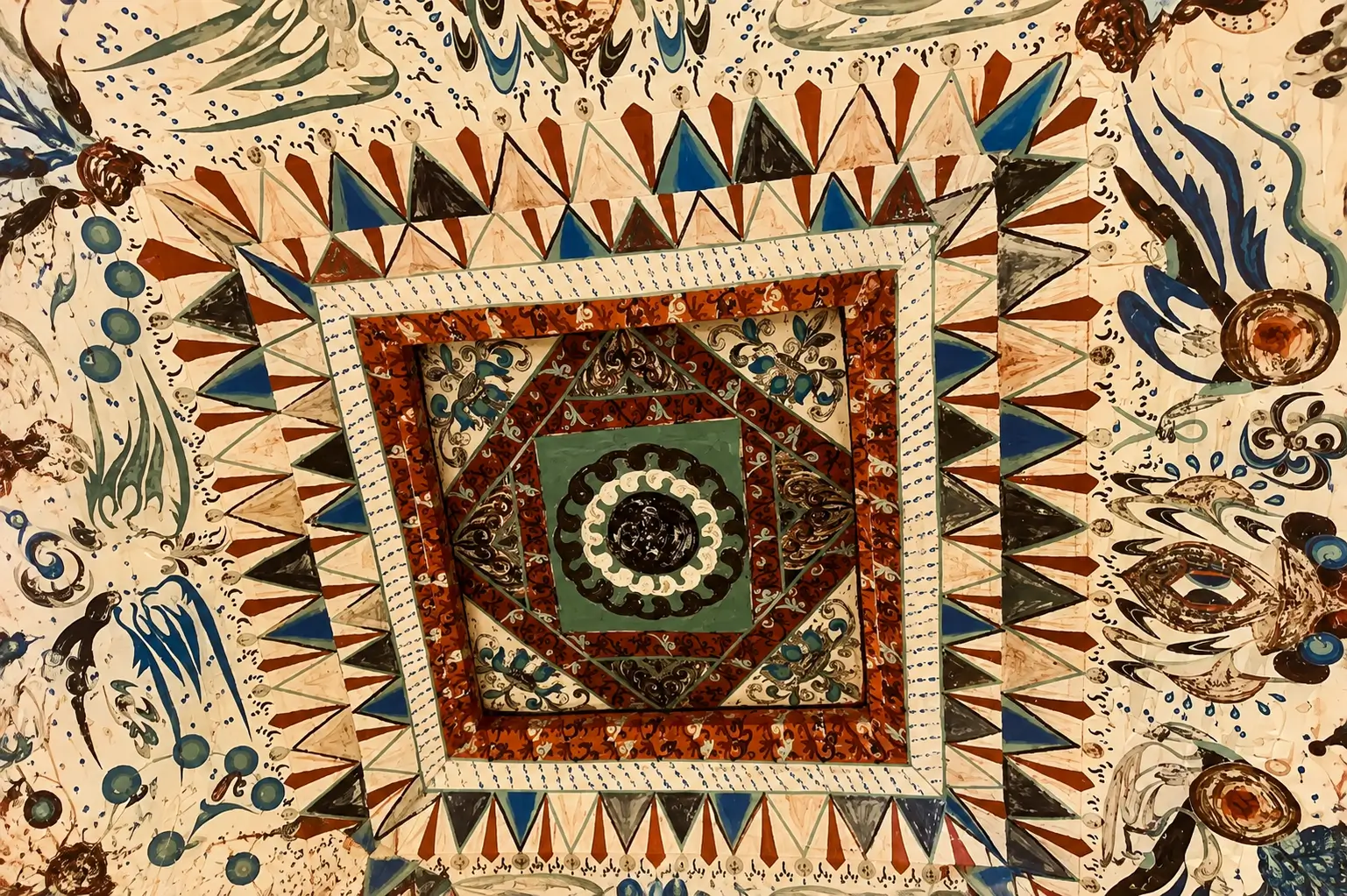 Dunhuang Cave 285 caisson ceiling mural with geometric patterns and vivid colors.