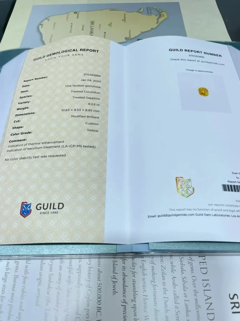 GUILD Gem Lab report indicating beryllium treatment in yellow sapphire  