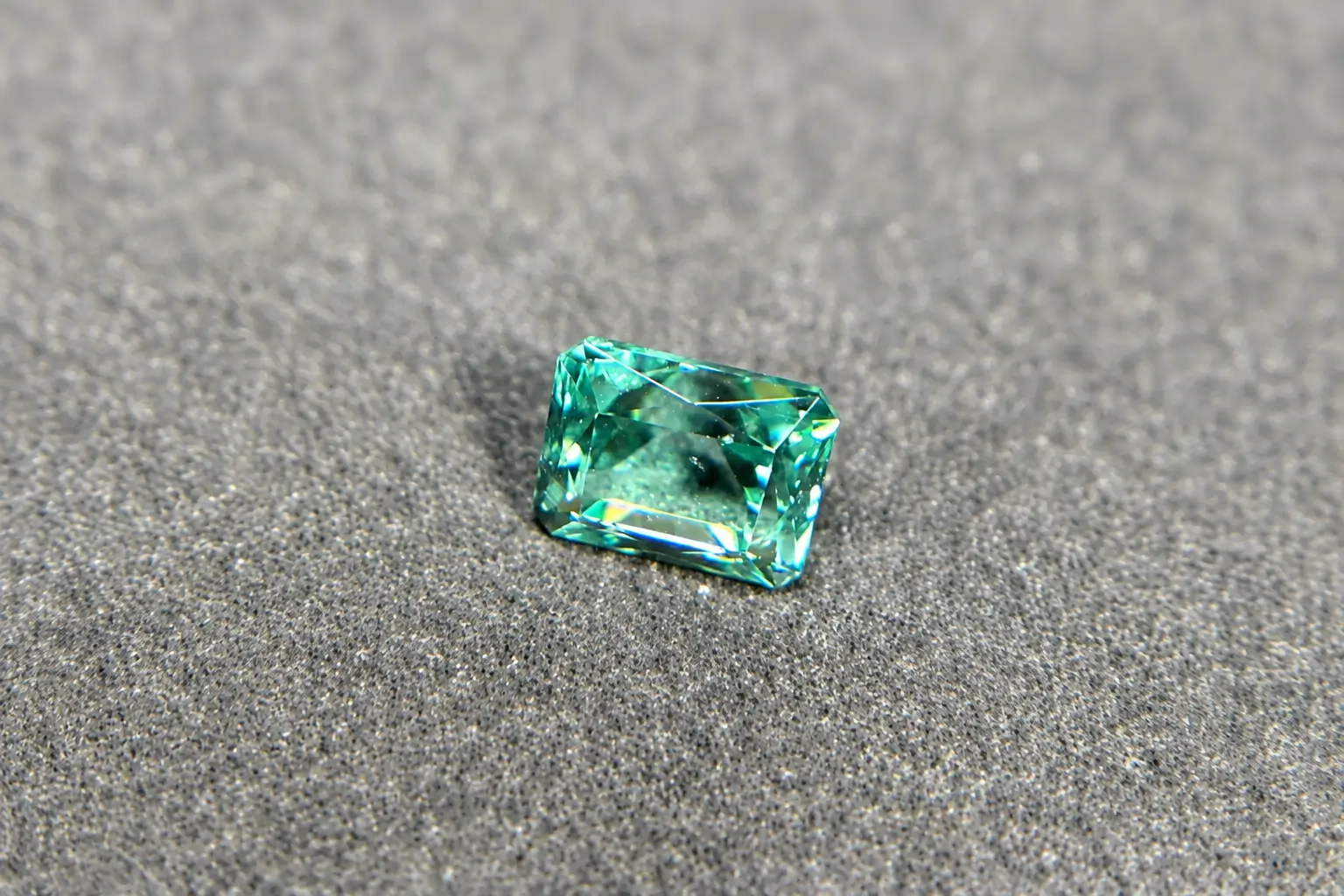 2.62 ct high-quality faceted phosphophyllite gemstone with a pale blue-green color.