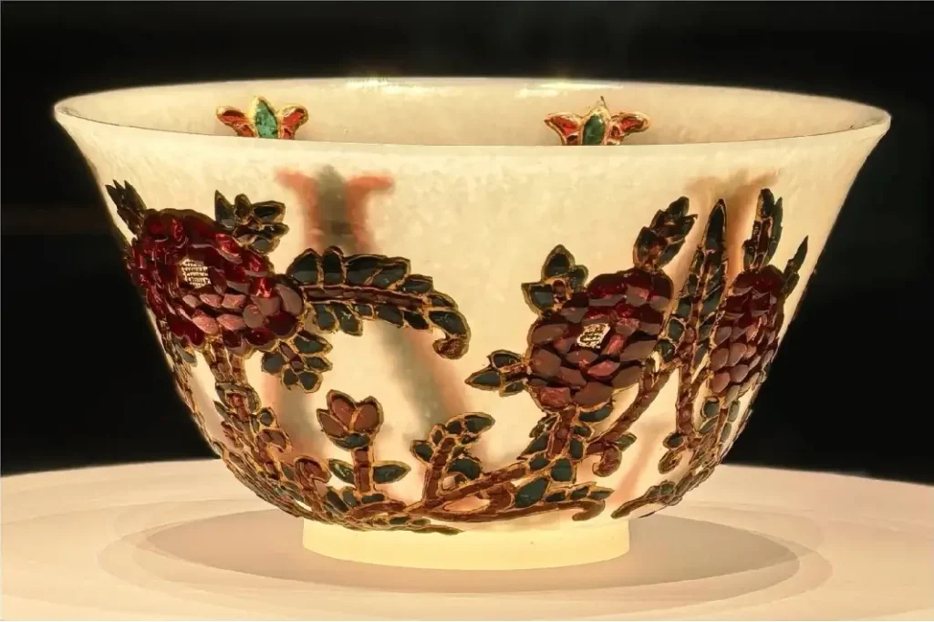 Qianlong-period white jade bowl with gem inlays and gold decoration