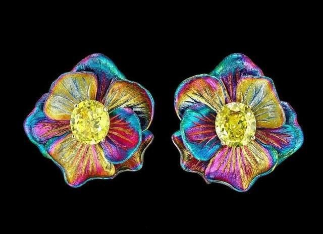 Anabela Chan's Rainbow Bloom drop earrings feature two oval-cut citrines set in a flower-shaped aluminum base.