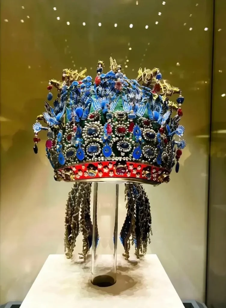 Ming Dynasty Empress Xiaoduan's Nine-Dragon and Nine-Phoenix Crown decorated with kingfisher feathers, gemstones, and pearls.